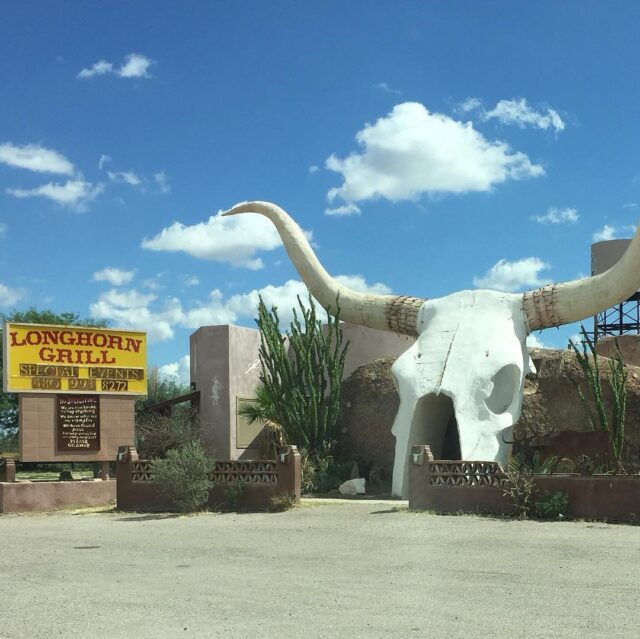 I was fairly young when I first visited Tucson AZ. We visited Old Tucson, Bisbee, and Tombstone. We even made the drive to visit the Longhorn Grill. Such an Iconic entrance to walk through the skull to go feast on some amazing steaks. 

I visited again many years later when I lived in Tucson and sadly it had been shut down and looked abandoned. Love to hear it is back in business again. 

-------

The Longhorn Grill & Saloon in Amado, AZ
Opened in the 1970s, this legendary spot just south of Tucson is known for its massive longhorn skull entrance — a true roadside icon. Over the years, it’s been a steakhouse, biker bar, and even sat empty for a while. In 2018, it was brought back to life and now serves up classic Southwest fare with plenty of character.

Old-school charm, revived.

#LonghornGrill #ArizonaHistory #RoadsideAttraction #SouthwestEats #TucsonToNogales #OnlyInArizona #tucson
